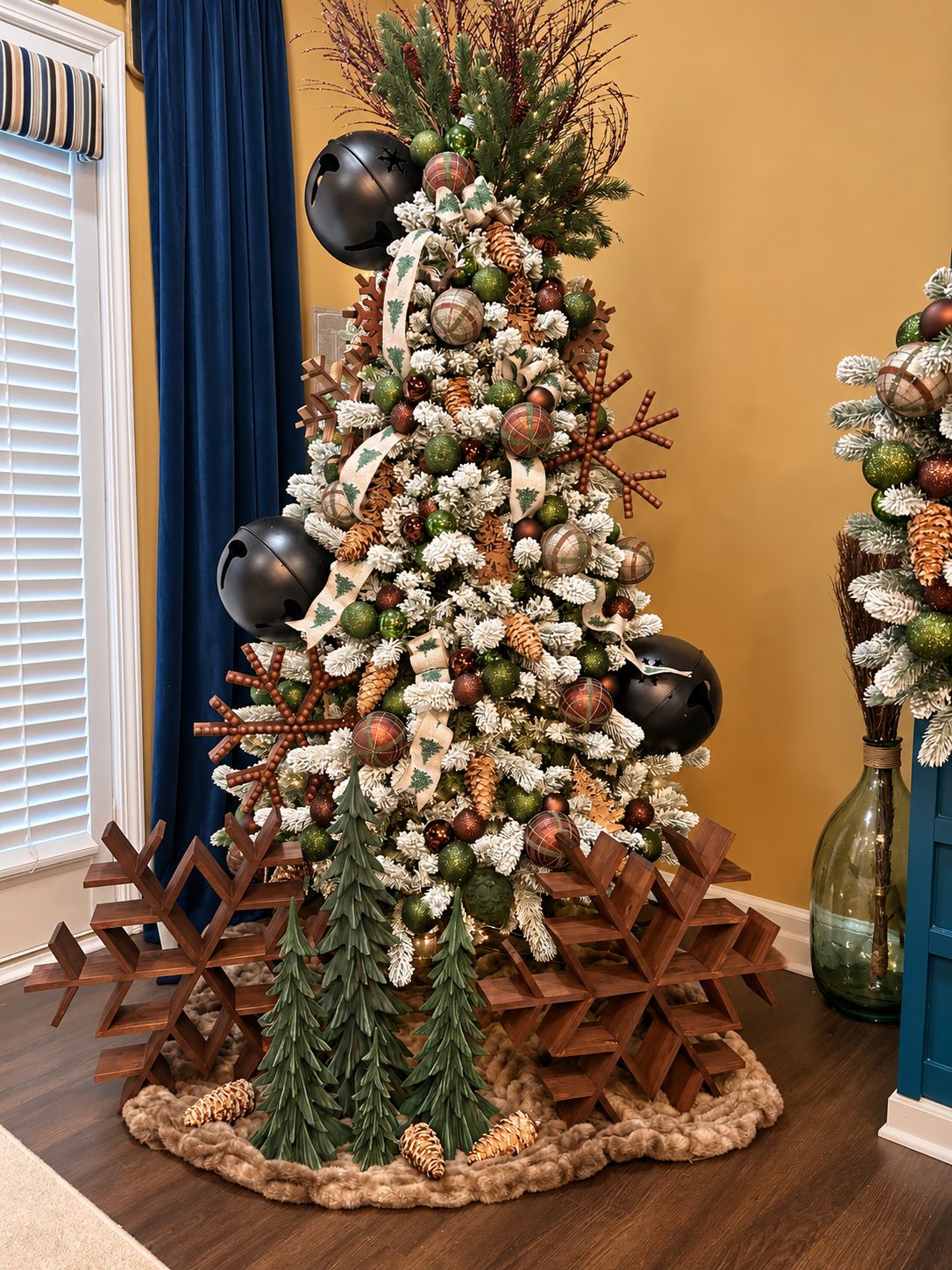 Rustic woodland Christmas tree with natural wood and green accents